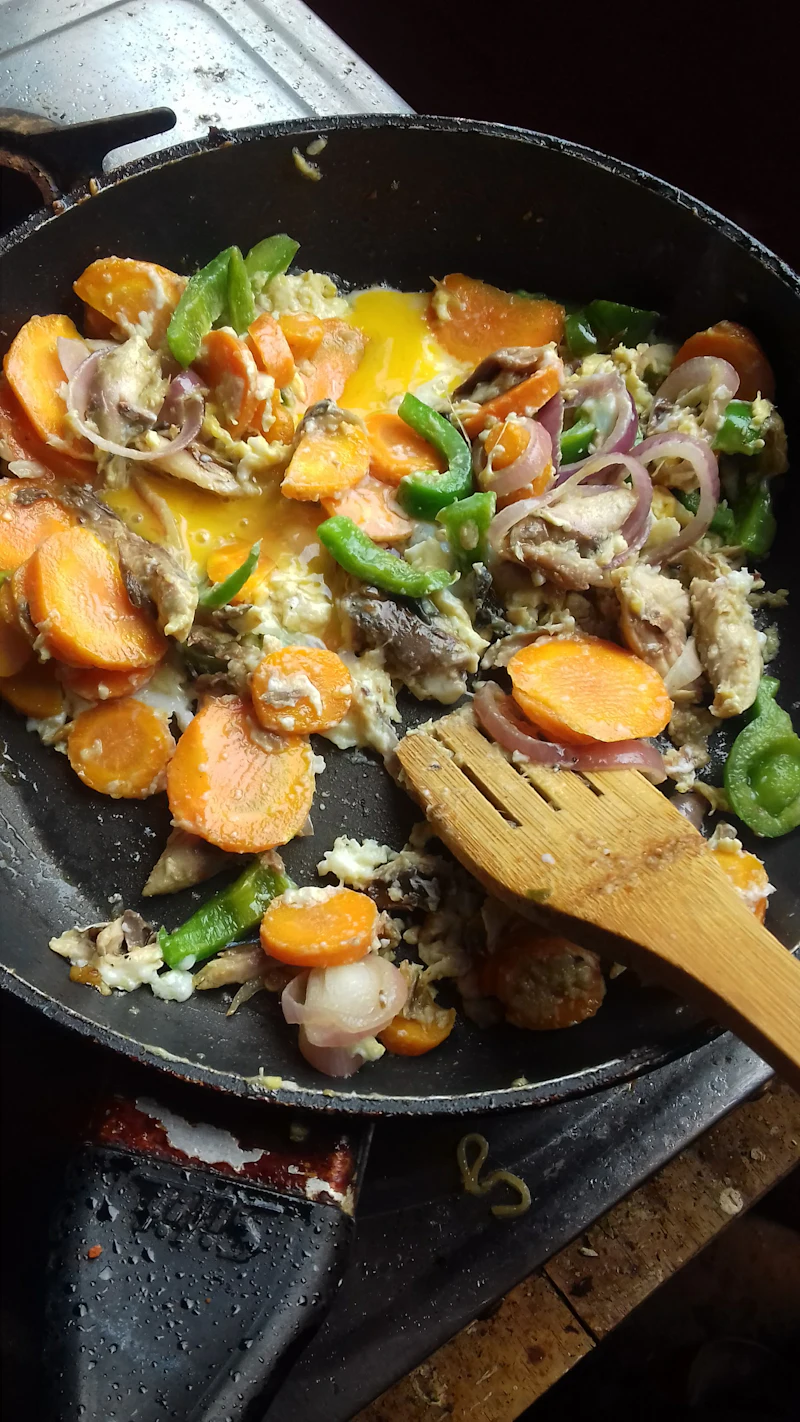 Sauteing fresh vegetables in a pan