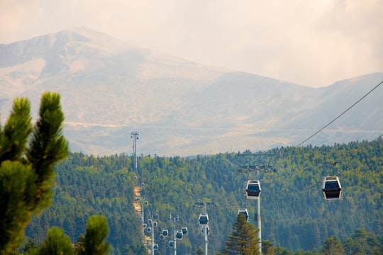 black cable carts on mountain at daytime in BURSA TELEFERİK Turkey