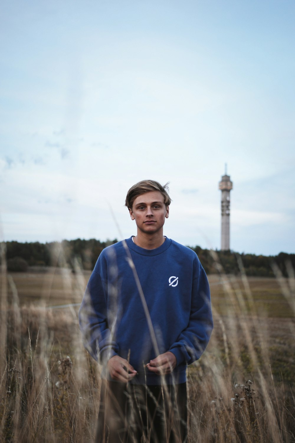 man standing on hill outdoor