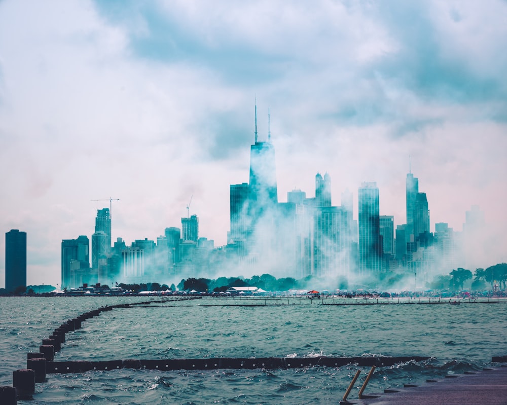 photo of city covered with fogs