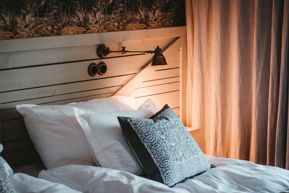 bedside-light-on-white-bedding 