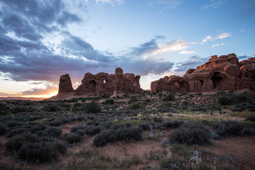 brown rock formation under blue sky at daytime