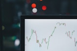 selective focus photography of graph