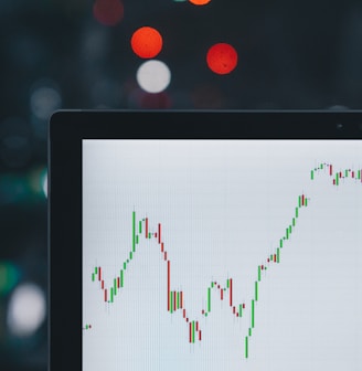 selective focus photography of graph