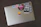 Close-up of a colorful customized vinyl sticker on a laptop showing detailed artwork.