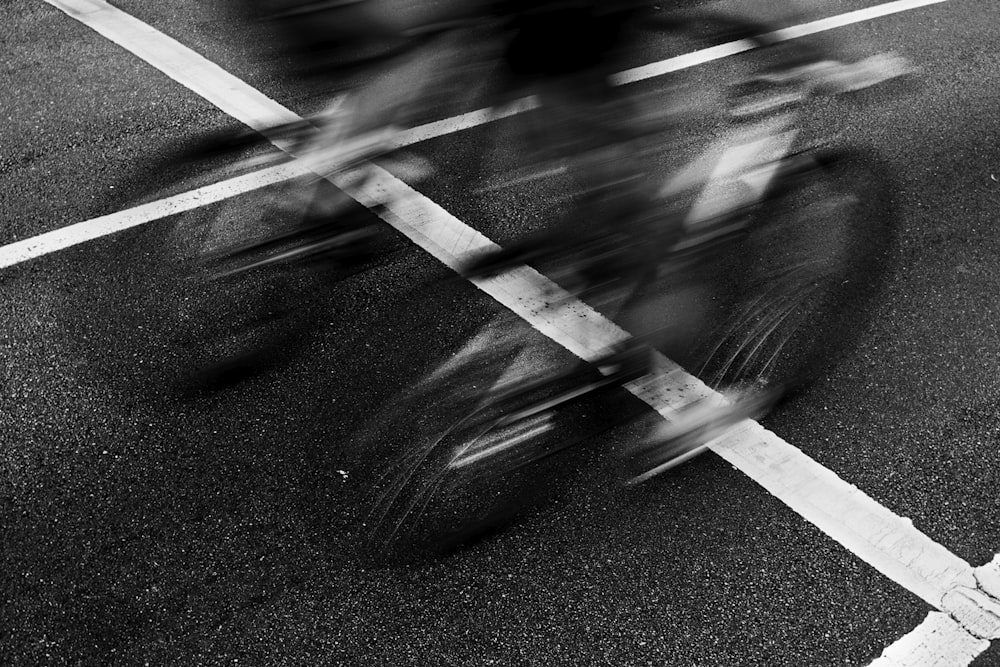 two bike on gray top road