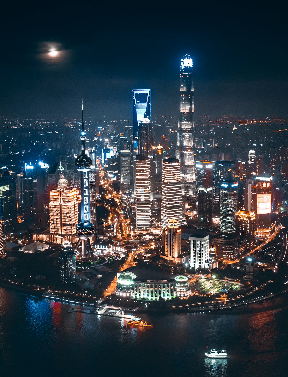 Aerial view of Shanghai's illuminated skyline at night showcasing China's modern technology hub