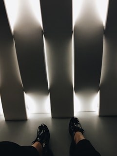 A vibrant image of a customer trying on shoes in a cozy store environment.