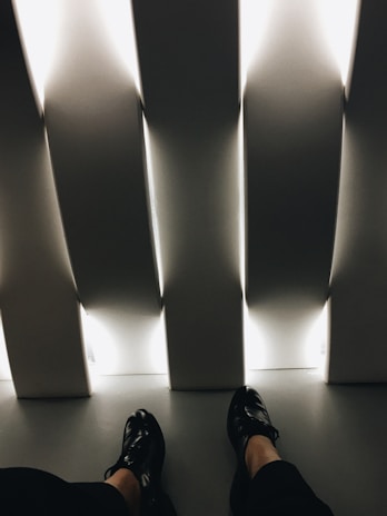 A vibrant image of a customer trying on shoes in a cozy store environment.