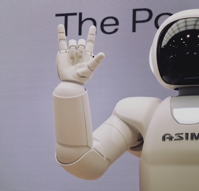 Asimo robot doing handsign