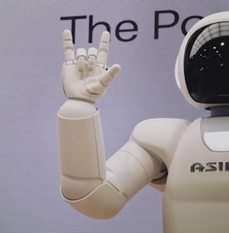 Asimo robot doing handsign