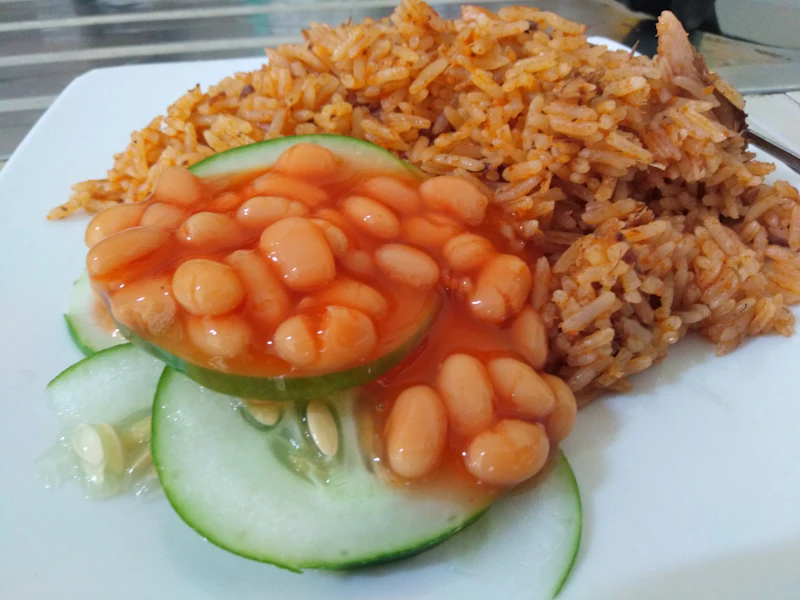 A shared plate of Ghanaian food