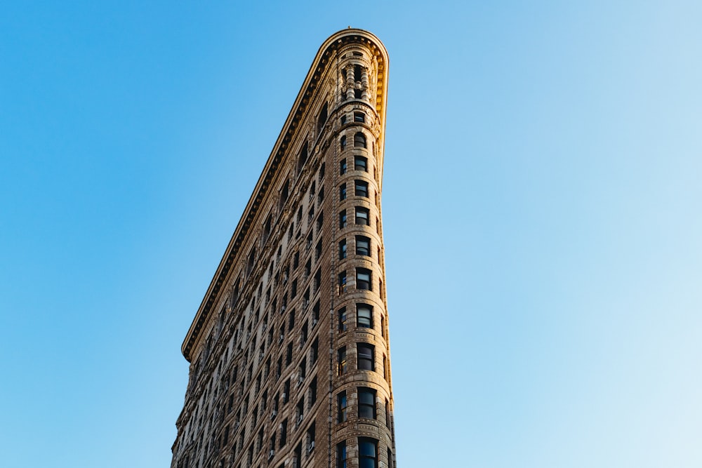 brown concrete building under blue sky during daytime