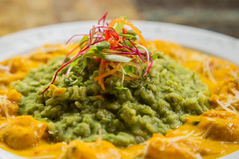 meat with yellow and green sauce