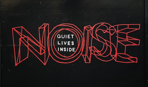 Noise text over black background