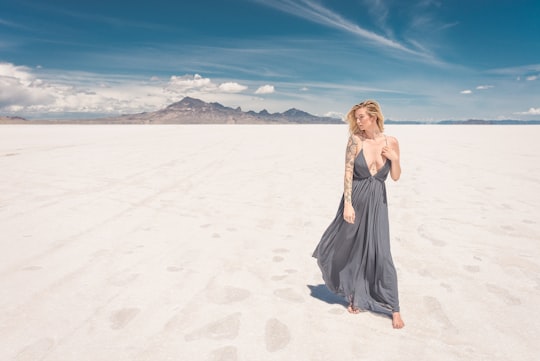 woman standing on white sands in Bonneville Salt Flats United States