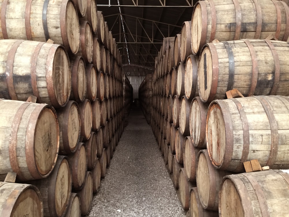 pile brown barrels inside building