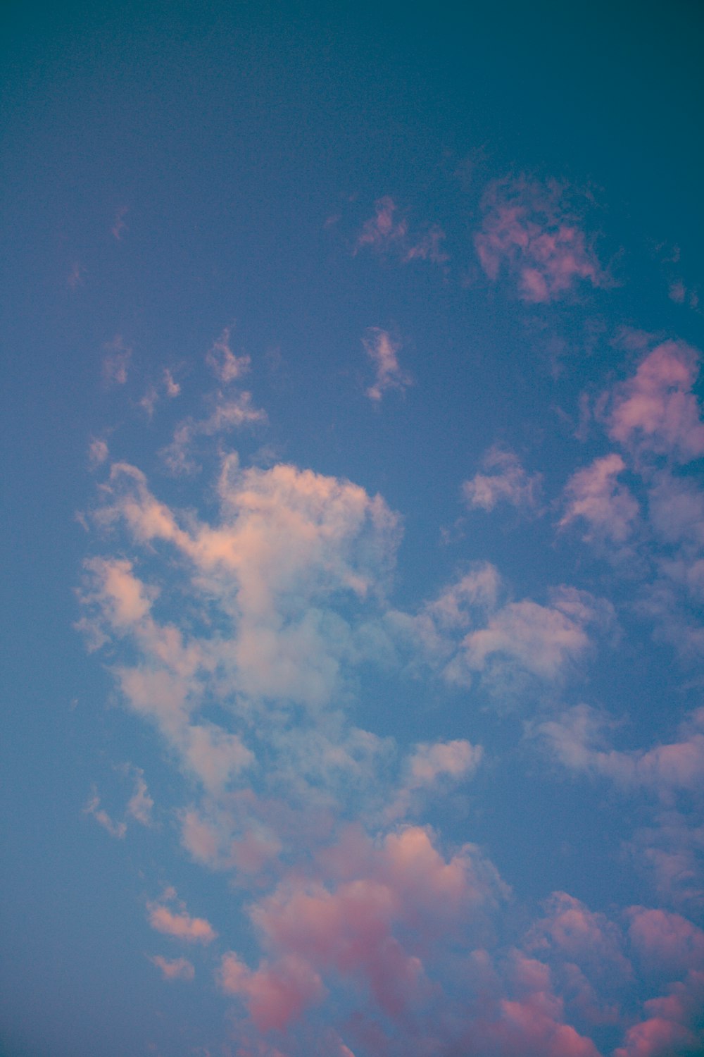 low angle photo of blue sky and white clouds