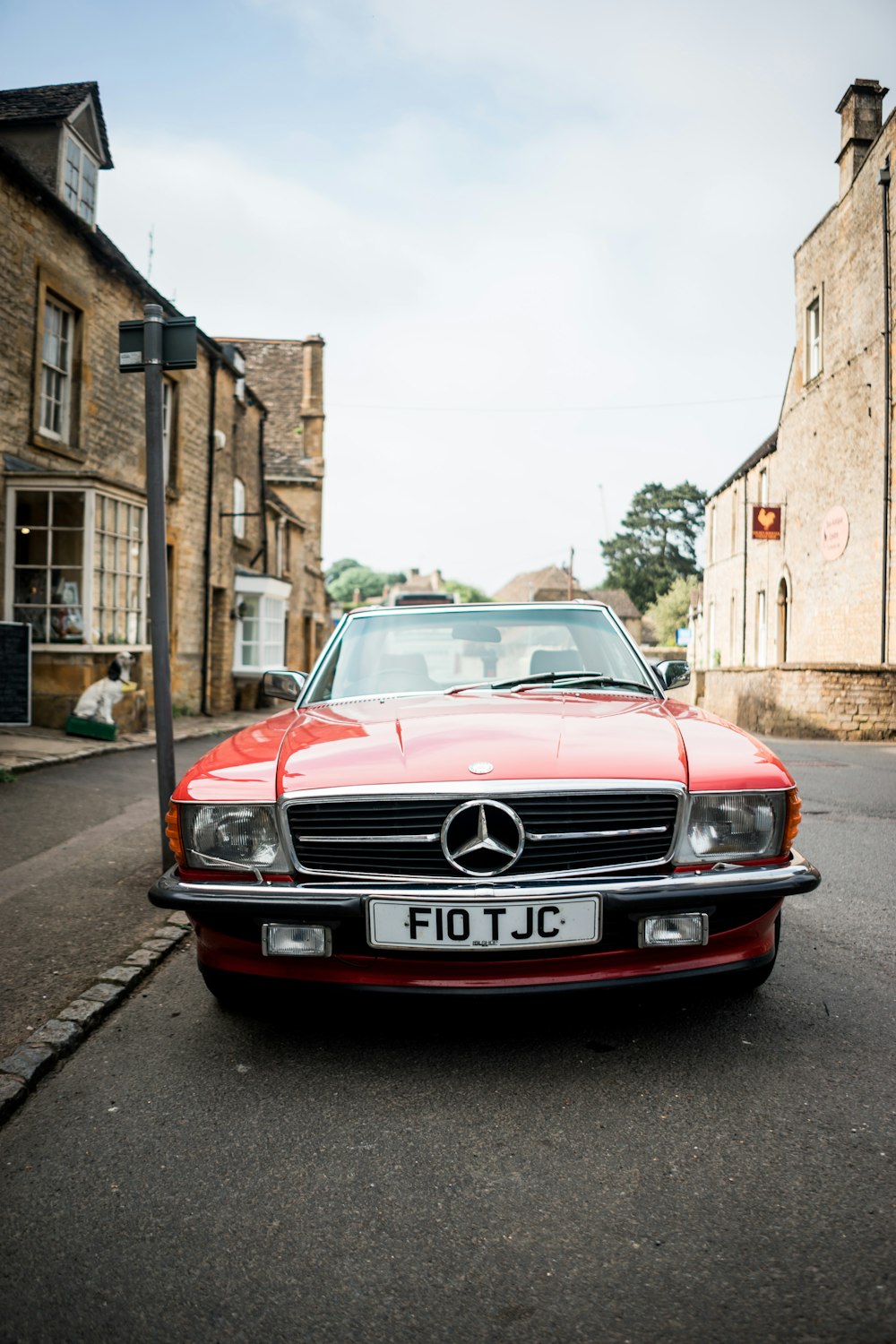 red Mercedes-Benz car