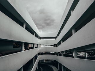 gray concrete building under cloudy sky