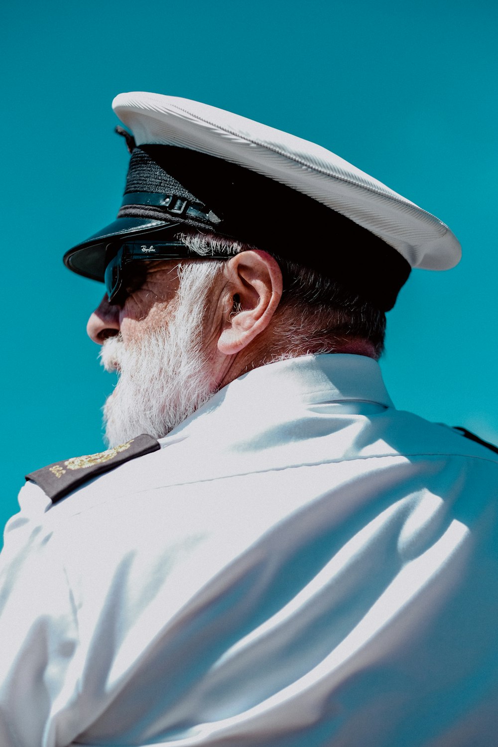 men's white peaked cap