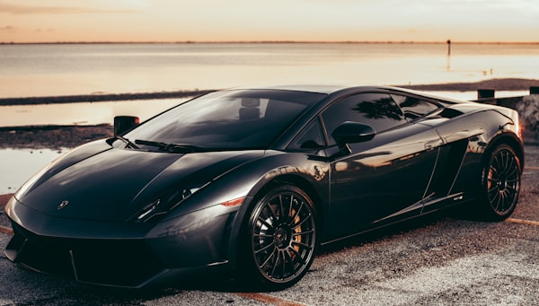 Black sports sedan in an urban street
