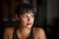 woman in black tank top standing in room