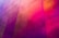 Large metal panels display vibrant shades of pink, purple, and orange. The surface is smooth yet slightly textured, with visible rivets at regular intervals.