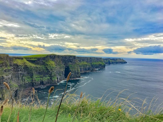 Body of water during daytime — Cliffs of Moher & the Burren, Ireland