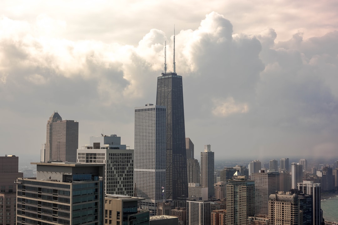 high rise building under cumulus clouds, John Hancock