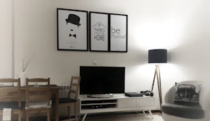 Entertainment center with clean lines and built-in storage in a cozy living room