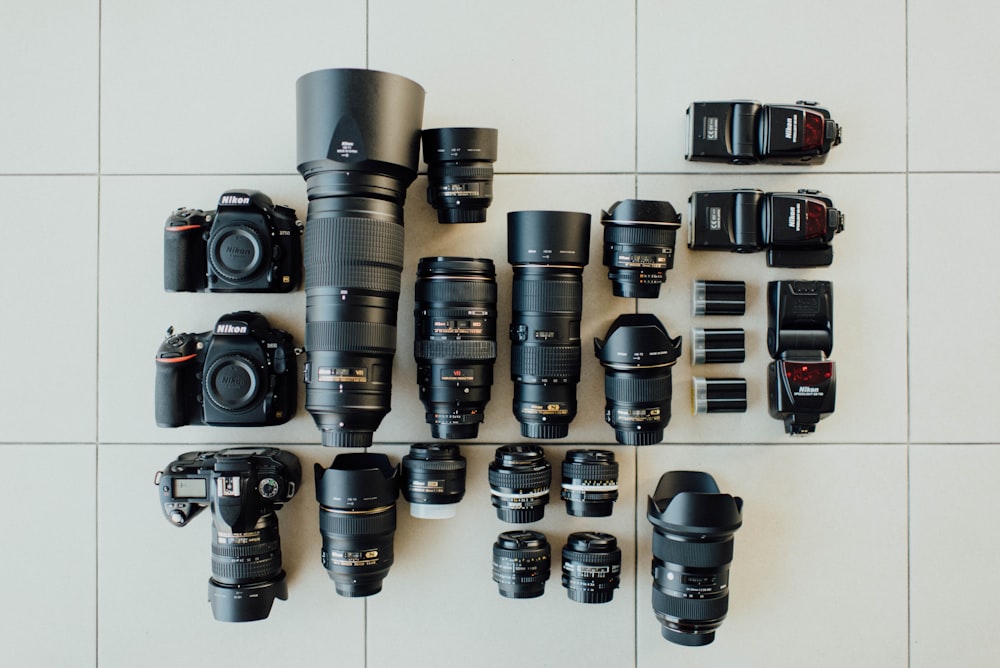 flat lay photography of DSLR camera set