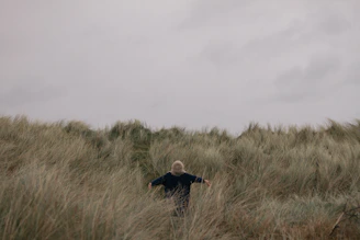 person in grass