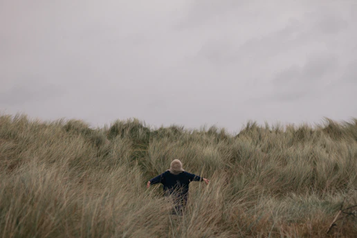 person in grass