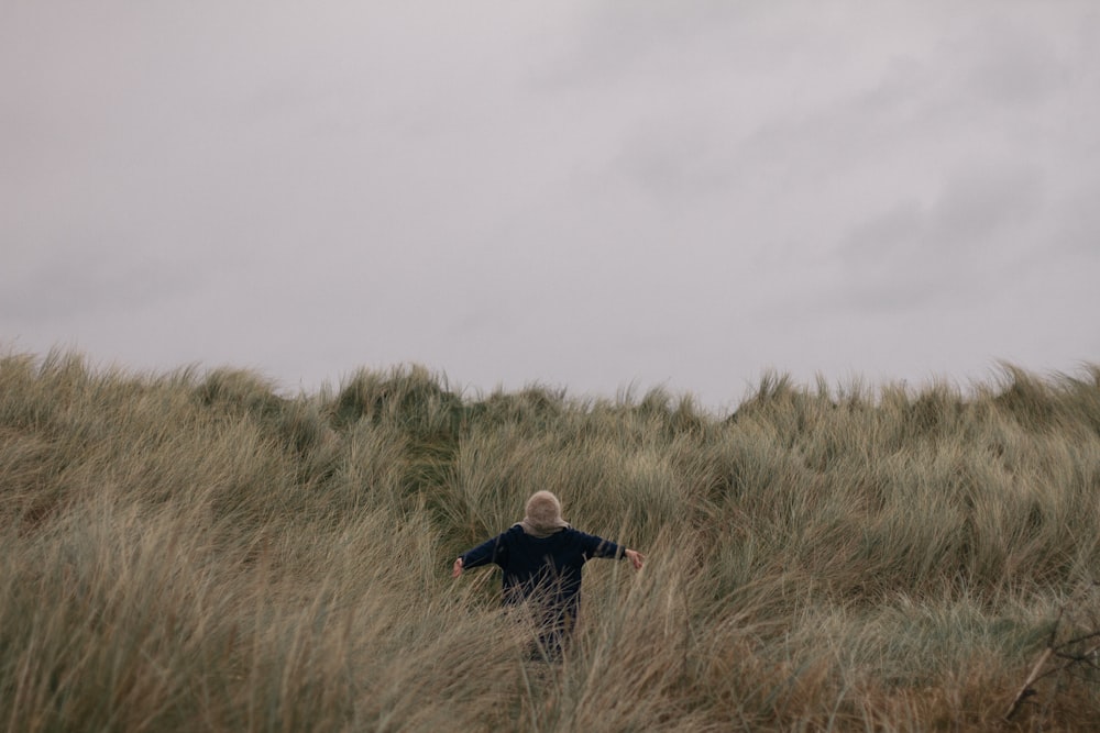 person in grass