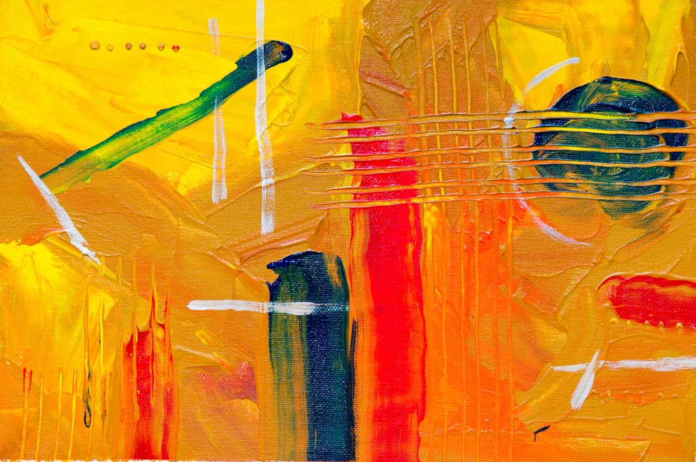 Pintura abstracta roja, amarilla y azul