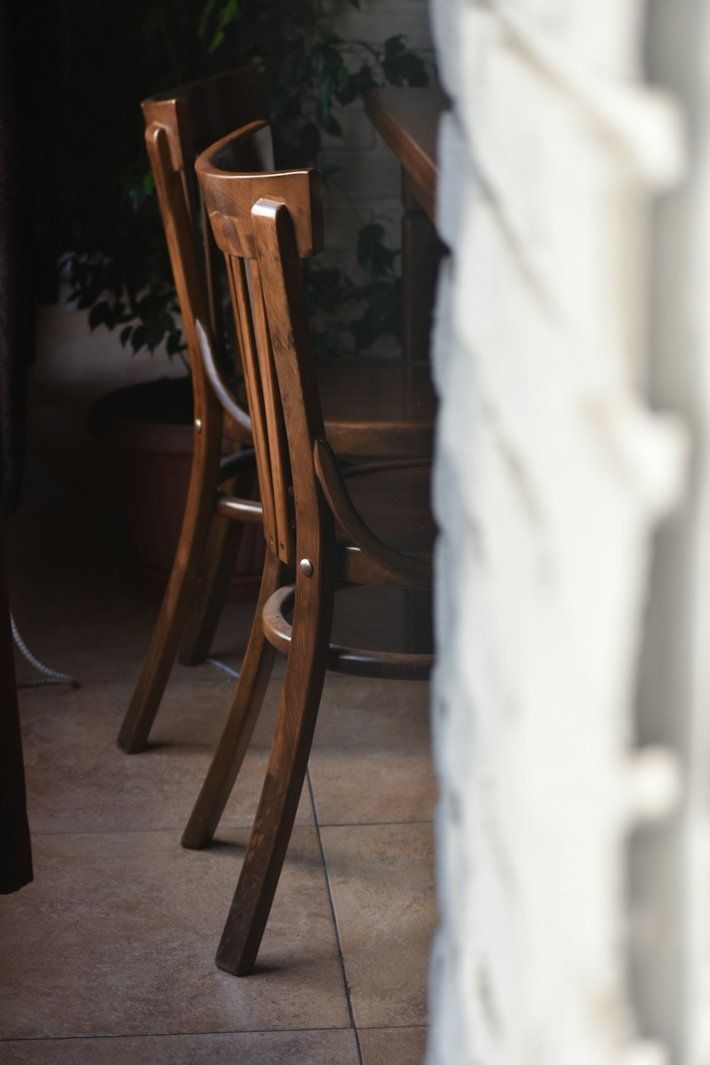 brown wooden chairs in front brown wooden table