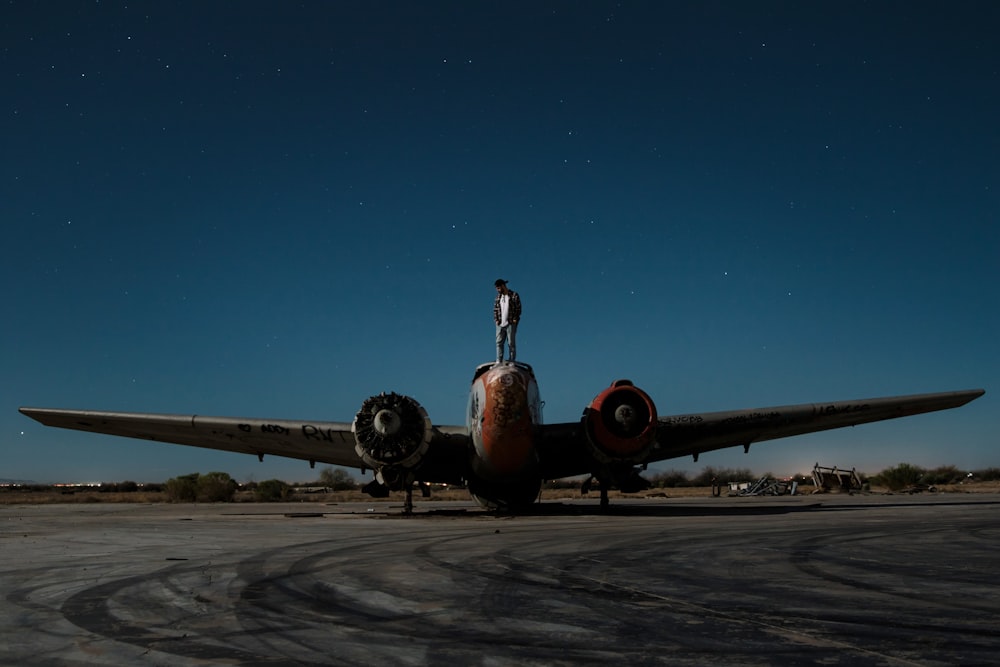 gray and orange airplane