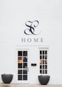 Home storefront beside white door