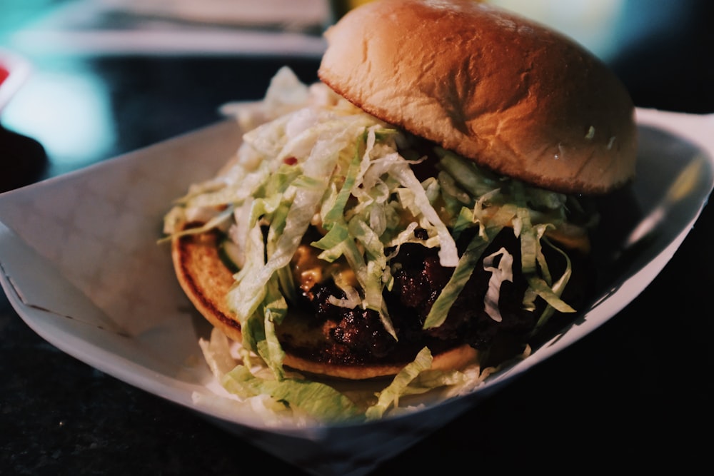 hamburger on white ceramic plate