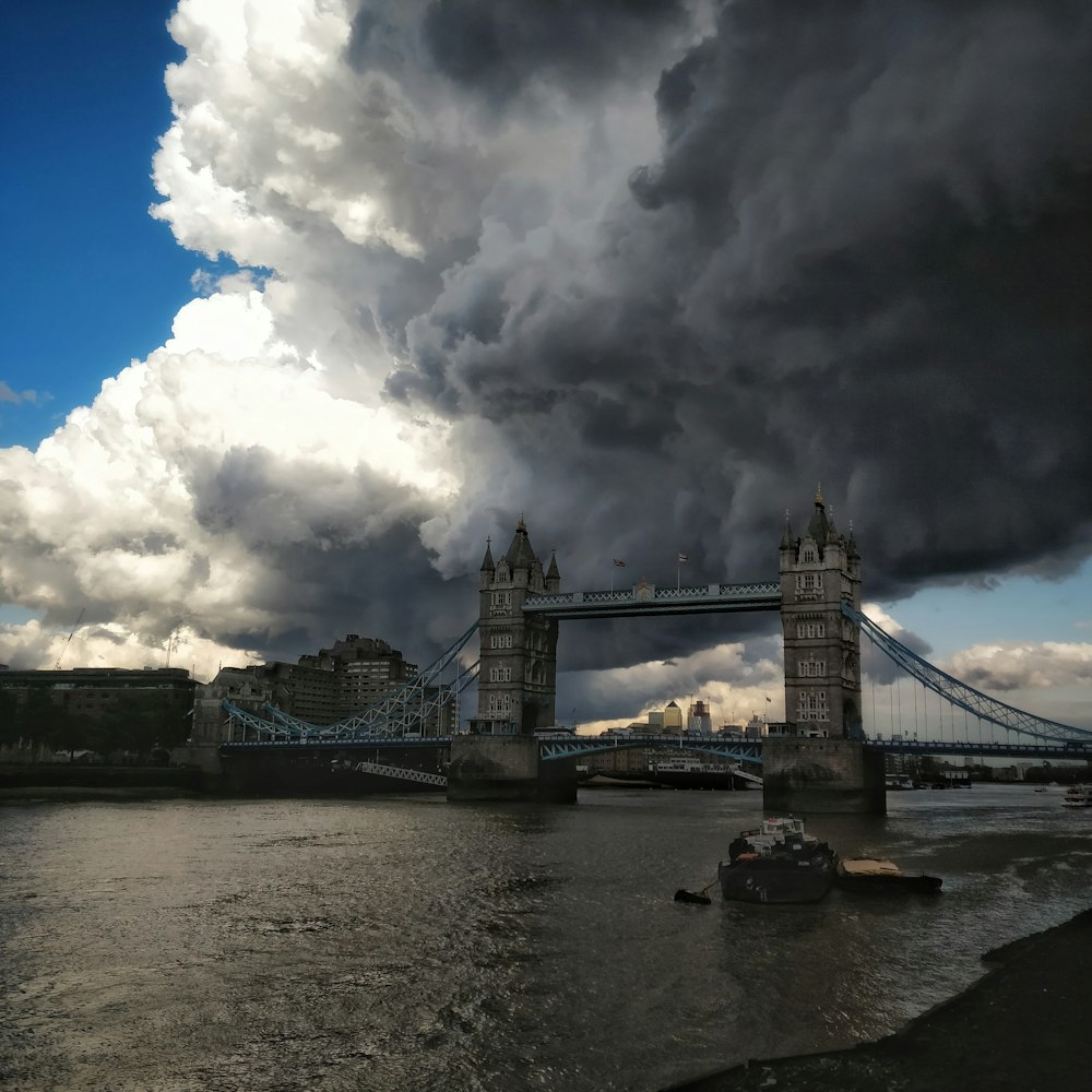 brown and blue tower bridge at daytime