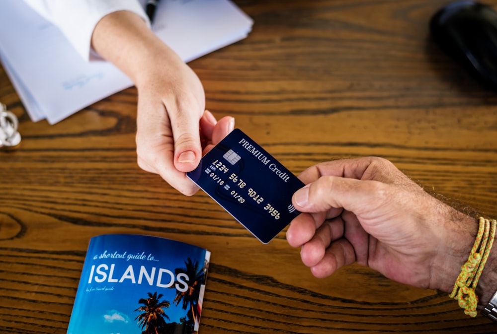 person picking blue card