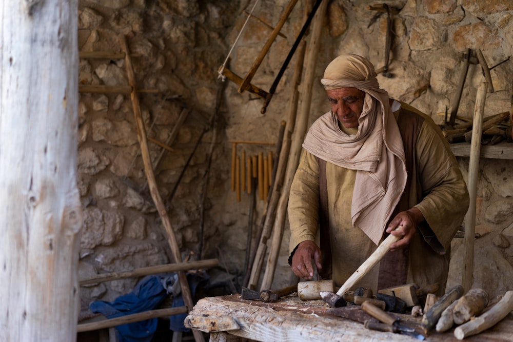 man holding hammer