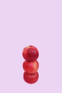 three overlapping honeycrisp apples