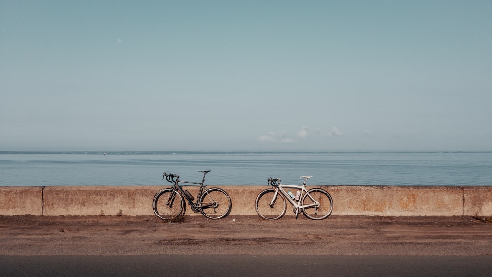 black and gray bicycles on sidewalk