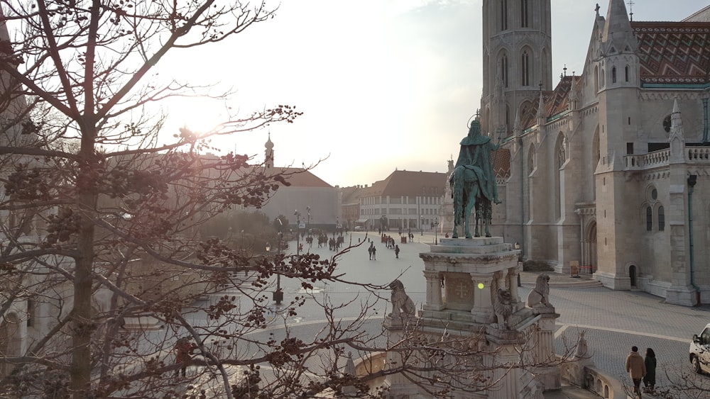 human statue and catherdral