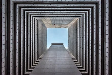 low-angle photography gray building