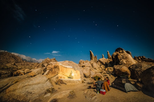 man and woman camping in Alabama Hills United States