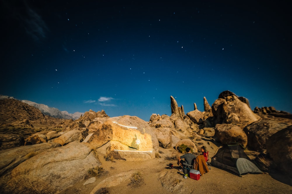 man and woman camping