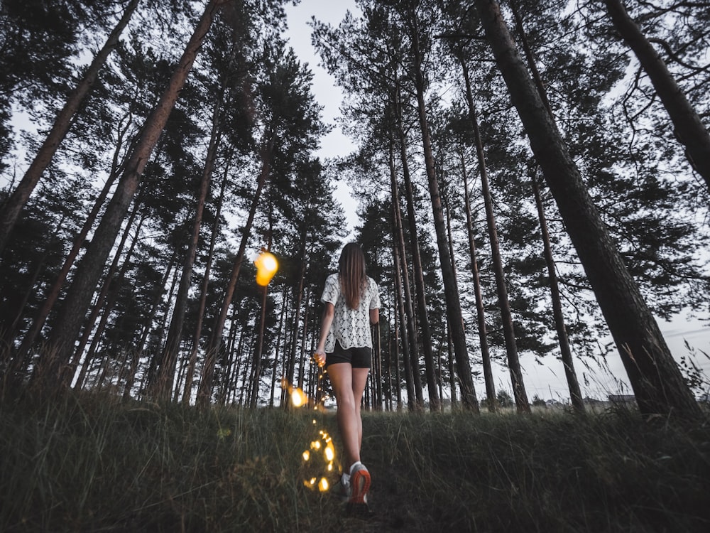 woman walking in forest